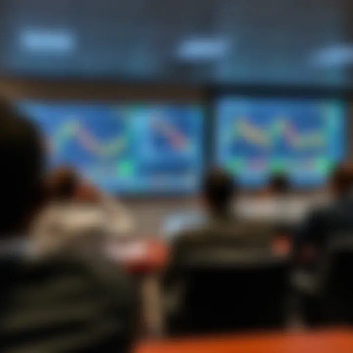 A classroom setting with forex charts projected on a screen during a trading seminar