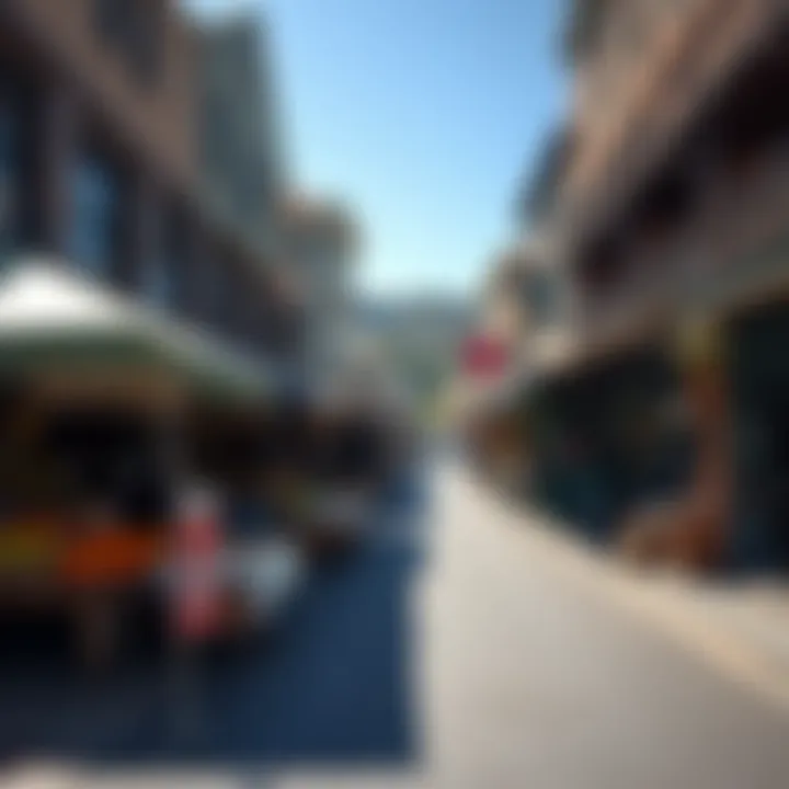 Knysna street with shops and market stalls open during trading hours on a sunny day