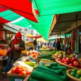 Colorful stalls at Durbanville Market showcasing fresh fruits, vegetables, and handmade crafts under bright canopies